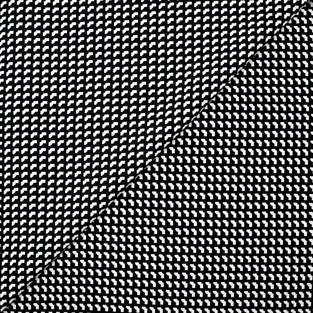 Crêpe viscose imprimée graphique mini blanc fond noir